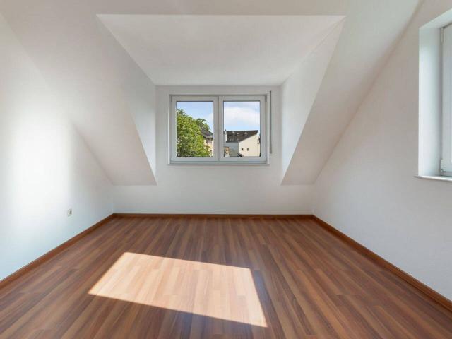 Bezugsfertige Dachgeschosswohnung im Herzen des Martinsviertels mit Tiefgaragenstellplatz