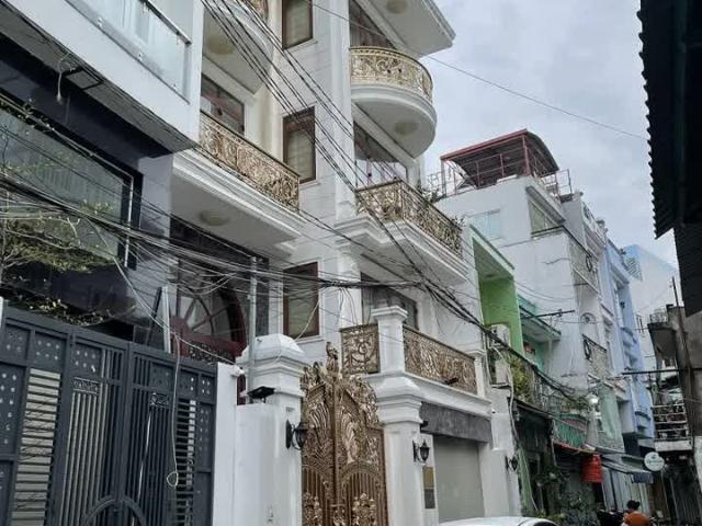 Biệt thự HXH Tân Phú, gần vòng xoay Âu Cơ Lạc Long Quân. 9x13.8, 4 tầng, Có thang máy, gara oto