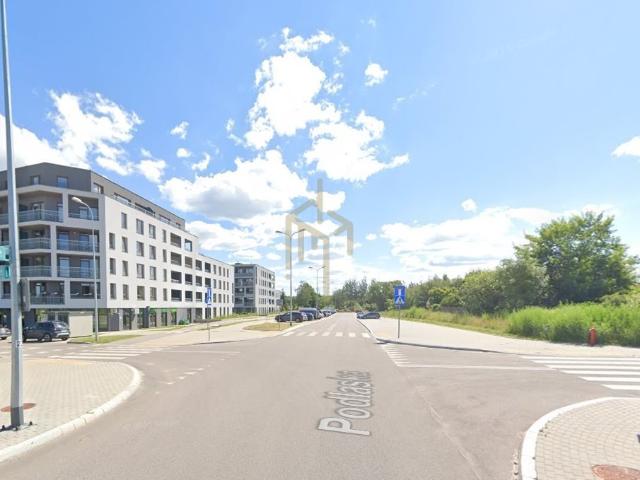 Działka usługowa 1386 m² z dojazdem asfaltowym
