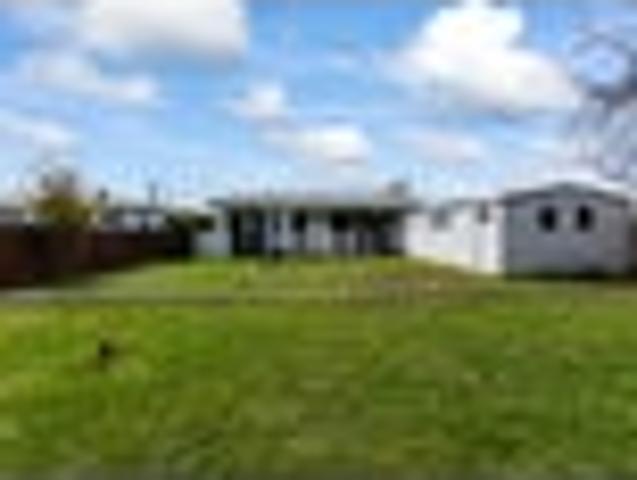 Big Yard, Big Garage, Great First Home!