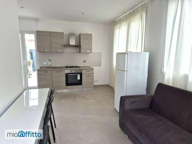 Bilocale arredato con terrazzo Saxarubra, labaro, prima porta