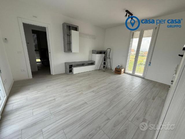 Bilocale con terrazzo e garage