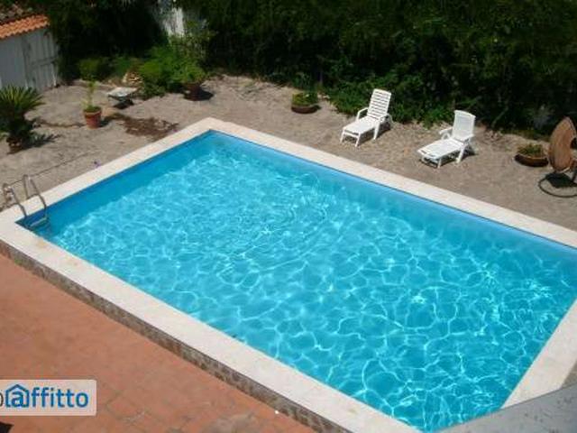 Bilocale con terrazzo e piscina Pinetamare