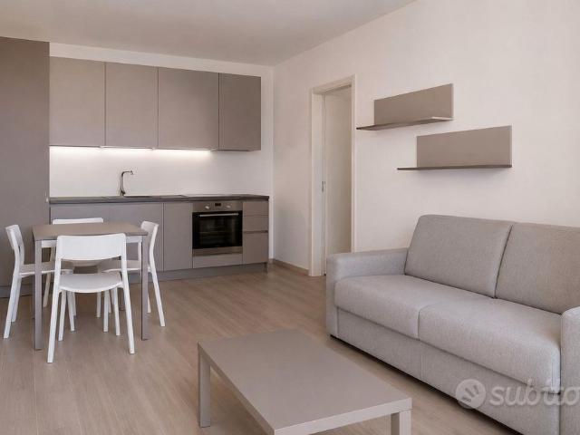 Bilocale con terrazzo e posto auto