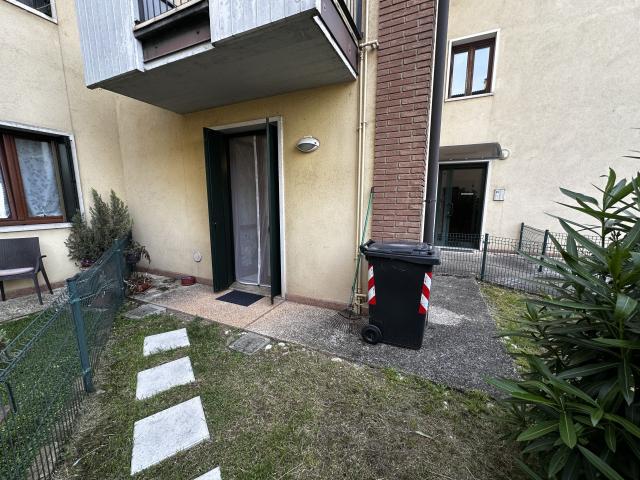 BILOCALE PIANO TERRA CON GIARDINO E GARAGE
