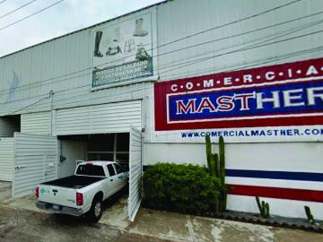 Bodega comercial de 700 m2 con Oficinas y anden para Trailer