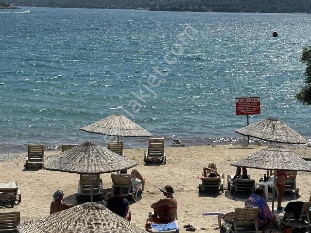 Bodrum Boğaziçi Adabükü 2+1 Plajlı Geniş Bahçeli Satılık Daire