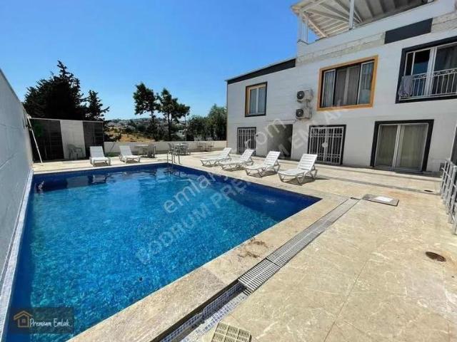 Bodrum Eskiçeşme'de Satılık Havuzlu Lüks 1+1 Daire