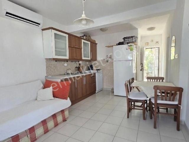 Bodrum Yahşi’de Özel Plajlı Çapa Tatil Köyünde Satılık 2+1 Daire