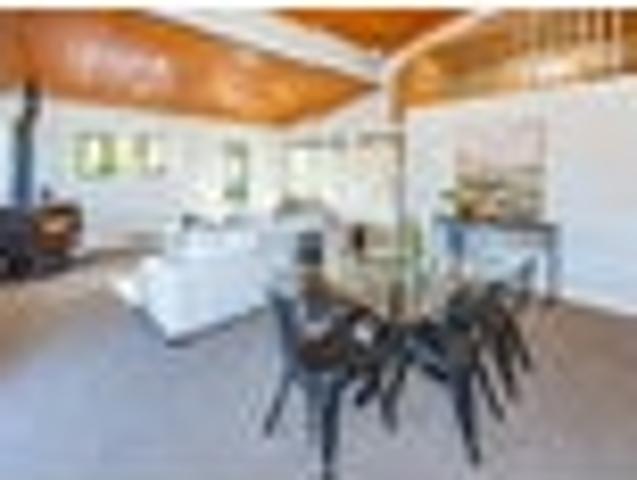Bold barn style living with an industrial edge