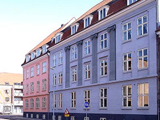 Blandet boligområde tæt på centrum med grønne områder