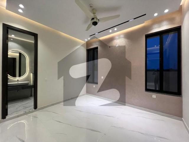 Brand New 10 Marla Designer House Near Dolmen Mall DHA Phase 5