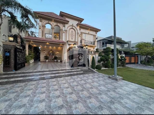 Brand new 1 kanal elegant and super hot located furnished bungalow with basement is available in the best block of dha lahore