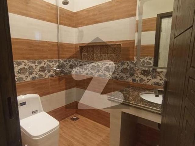 Brand new 1st entry house for rent vip lotion untouched house ready to shift real pics and video available very near to main kahyaban e jinnah rood architects engineers housing society