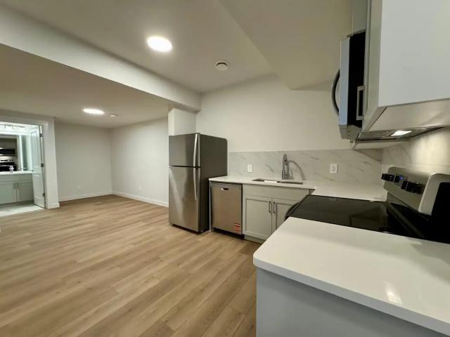 BRAND NEW 2 BED LEGAL SUITE IN SW walking distance to ALL!
