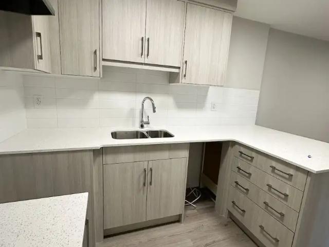 Private Room Available in Modern 2 Bedroom, 2 Bathroom Legal Basement Suite