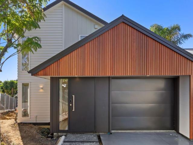BRAND NEW Five Bedroom home overlooking Waiatarua reserve