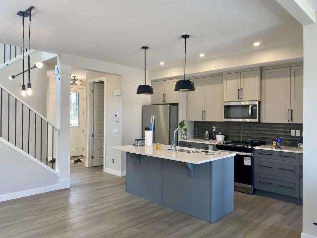Brand New Home with completed basement near Bow River Cochrane!