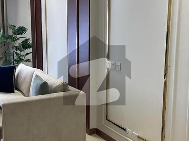Brand new one bed 1130 square feet fully luxury furnished apartment available for rent with open view penta square by dha lahore