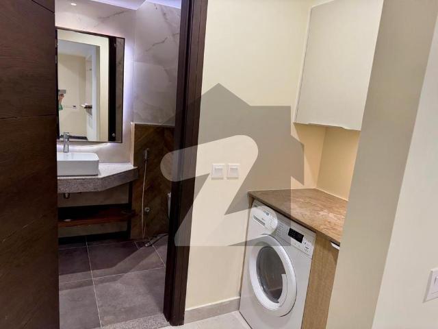 Brand new one bed with maid room luxury furnished apartment available for rent penta square by dha lahore