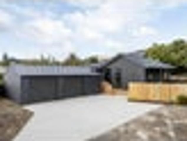 Brand New + Oversized Garage = Smart Buying