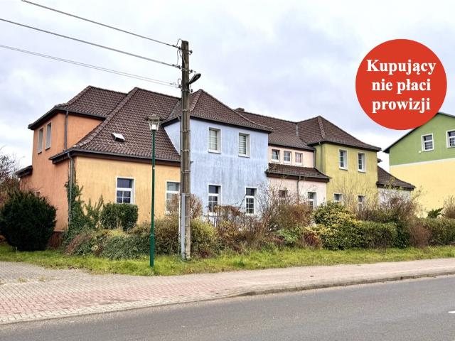 Dom wielorodzinny z 5 mieszkaniami i garażami w Tantow