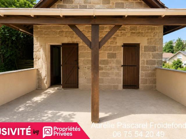 BRIVE: Grange en pierre, rénovée en Maison T4 d'env. 110m² 3 chambres + Bureau combles aménageables GARAGE et Atelier Terrain d'env. 2500m² et Terrasse couverte