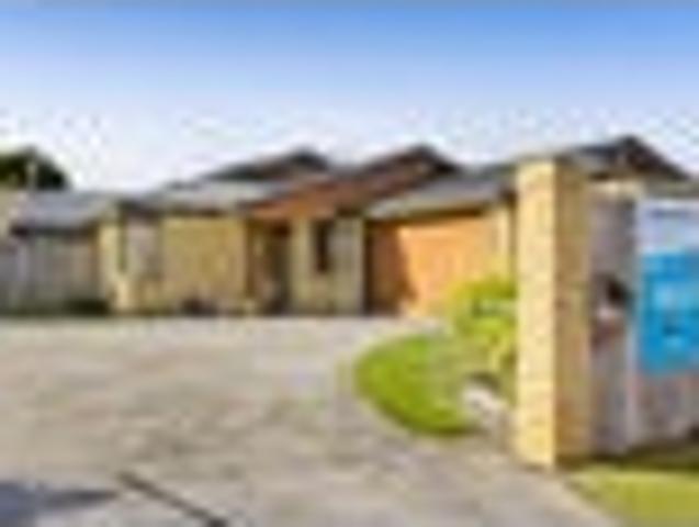 Brick Beauty in a Sought After Setting