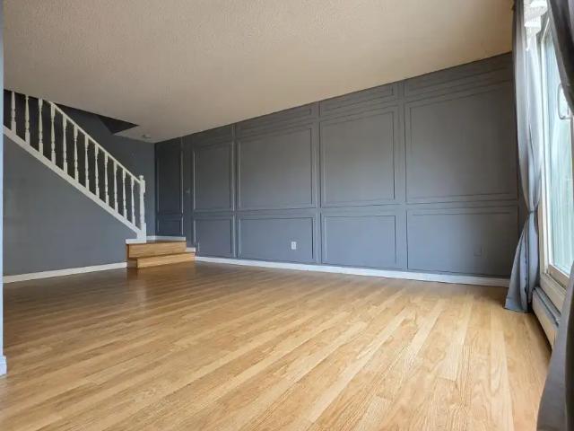 Bright 2 storey condo in Oliver | 2 BR | Heat+Water+Assigned Parking Included