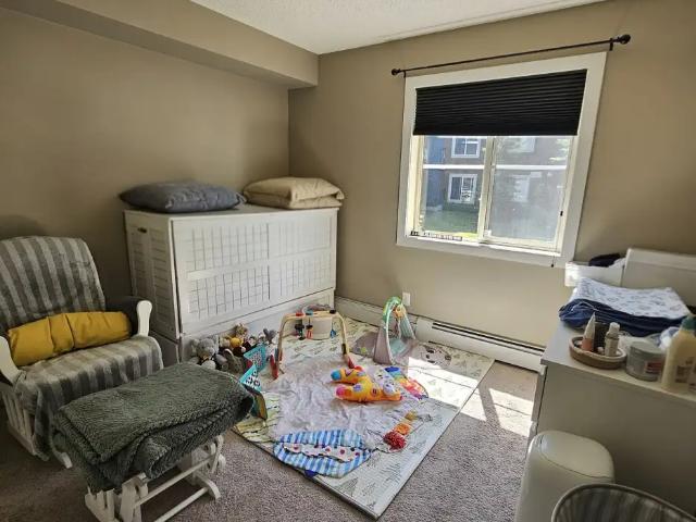 Bright 2BR + Den / 2BA Condo Includes Parking & In Suite Laundry