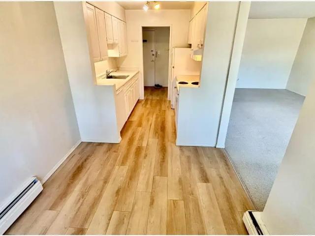 Bright, corner unit on second floor