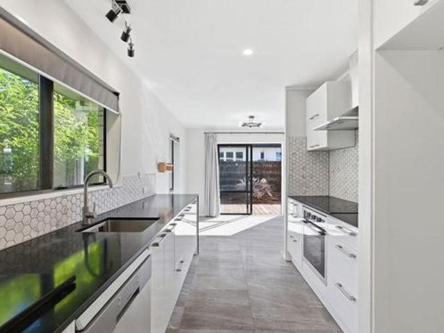 Bright and spacious, this sun filled two bedroom home offers comfortable living on a fully fenced, low maintenance rear section with added privacy