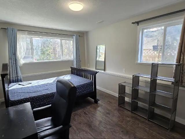 Bright, furnished room for rent main floor walking distance to UofC, LRT, Mall
