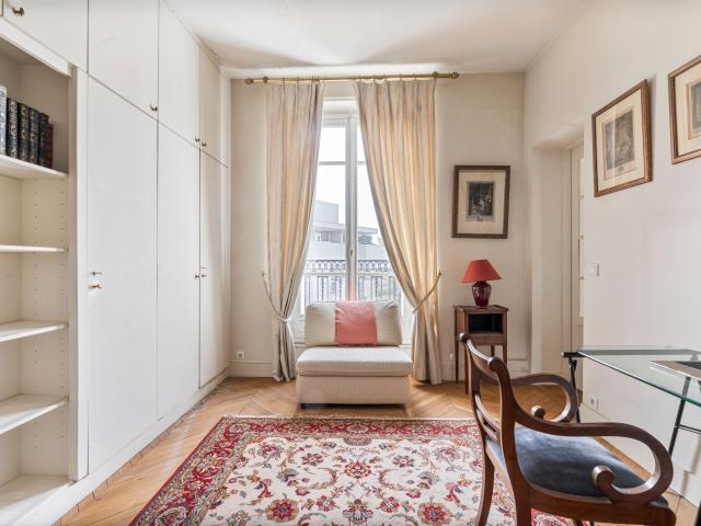 Bright Haussmann Apartment with Open Views