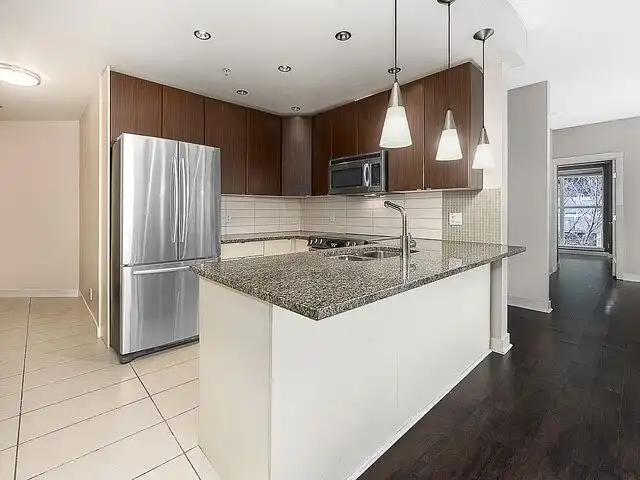 Bright & Spacious 2 Bed / 2 Bath Condo with Heated Underground Parking Near Down
