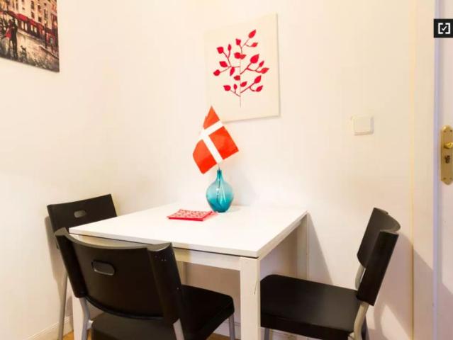 Bright room with chest of drawers in shared apartment, Latina