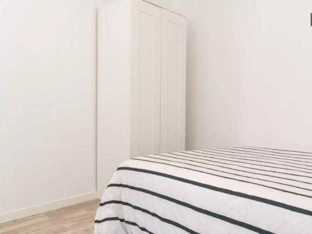 Bright room in 12 bedroom apartment in Sol, Madrid