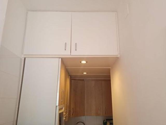 Bungalow adosado en residencial con parking y piscina en Benidorm con inquilino