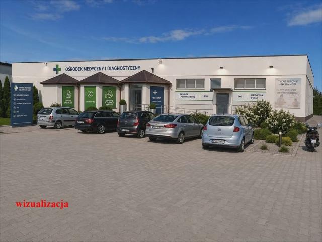 Budynek usługowy 307 m² z parkingiem i dochodami