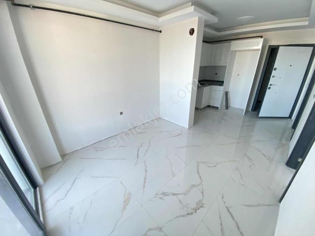 Bulut Emlak ara Kat Yerden Isıtmalı 1+1 Daire