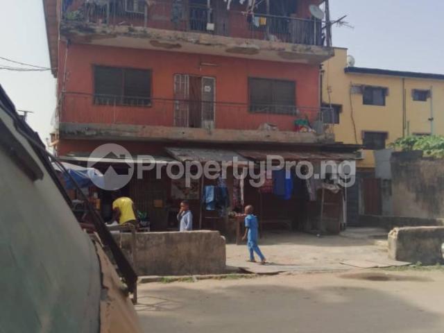 Buy 3 Floor Building With Shops On A Plot Of Land in Ilasamaja, Mushin Lagos 1MFEJ | PropertyPro Nigeria