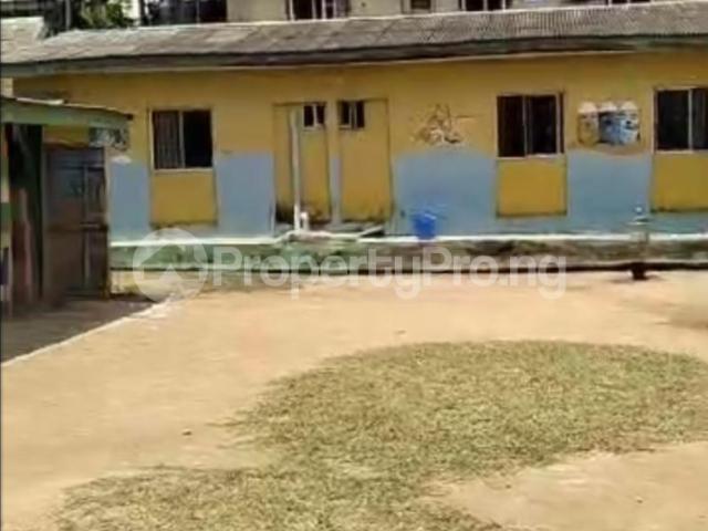 Buy Full Plot Of Dry Land With 3 Bungalows in Bucknor, Isolo Lagos 8LYYD | PropertyPro Nigeria