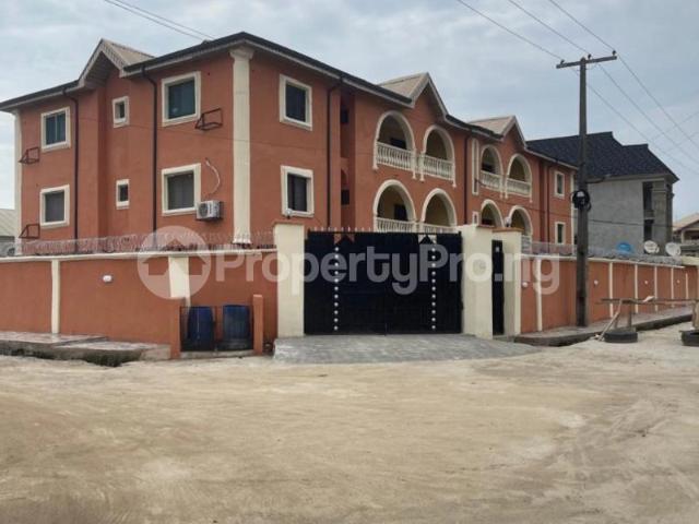 Buy Newly Renovated Block Of 6 Units in Ago palace, Okota Lagos 4NTYX | PropertyPro Nigeria