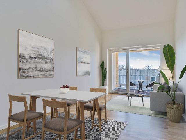 Bygården Modern lejlighed i lækre materialer med plads til familien