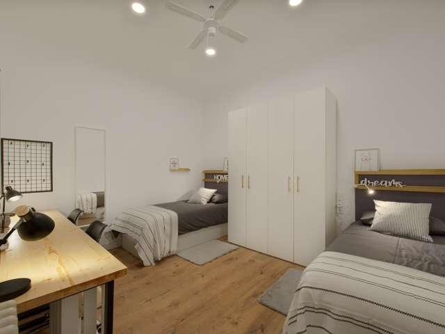 Cama en habitación compartida en piso de 7 habitaciones en Barcelona