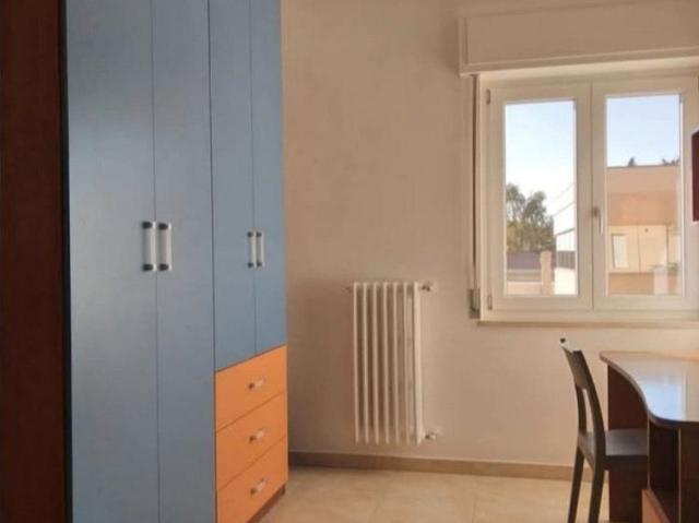 Camera a studentessa a Matera