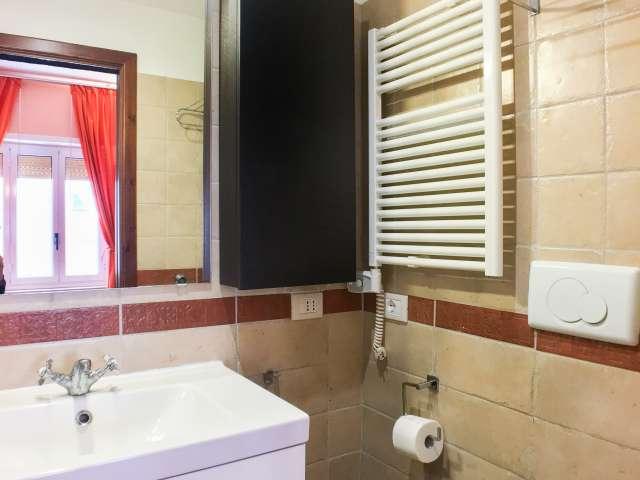 Camera in affitto in un appartamento condiviso con 4 camere da letto nel quartiere Quadraro di Roma
