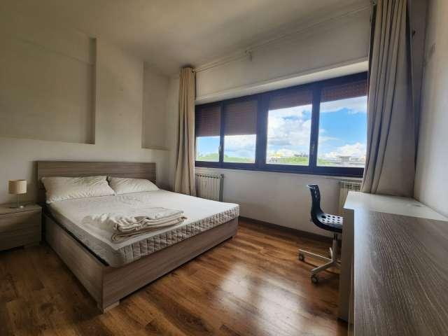Camera in affitto in un appartamento condiviso con 6 camere da letto a Garbatella, Roma