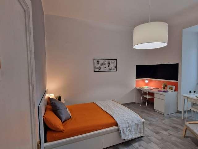 Camera in affitto in appartamento con 2 camere da letto a Roma
