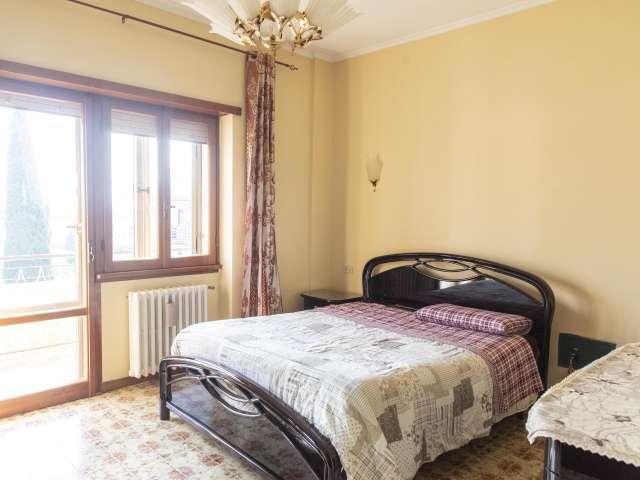 Camera in affitto in appartamento con 3 camere da letto a Roma